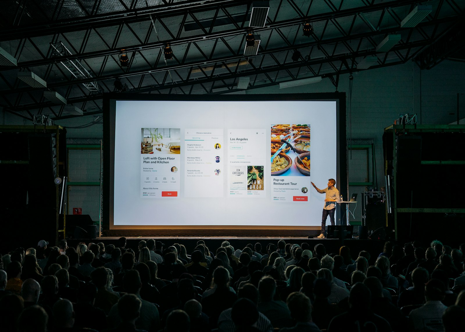 Audience at a Google conference watching a keynote presentation